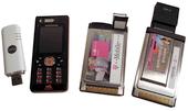 v.l.n.r.: UMTS Stick, Handy, PCMCIA Card und ExpressCard mit Adapter