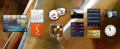 Die Minianwendungen von links nach rechts: Media Center, Kalender, Systemauslastung, Puzzle, Diashow, Aktien, News-Feeds, Währungsrechner, Wetter, Uhr