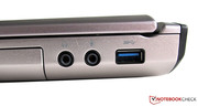Eine der drei USB 3.0-Buchsen, sowie Kopfhörer- und Mikrofon-Anschluss (3,5 mm)