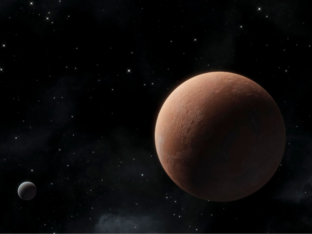 Ein Bild, das Pluto und seinen natürlichen Satelliten zeigt. (Bildquelle: Freepik)