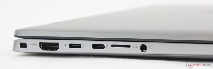 Links: Anschluss für ein Laptop-Schloss, HDMI 2.0, 2x USB-C mit Thunderbolt 4 + DisplayPort + Power Delivery, MicroSD-Leser, kombinierter 3,5-mm-Audioanschluss