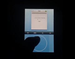 AcornOS erinnert an das OS des früheren iPod. Das Clickwheel ist virtuell. (Bild: Video-Screenshot)