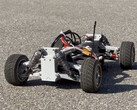 3D-printed RC chassis on asphalt
