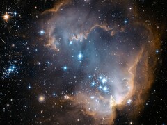 Hubble-Aufnahme einer Sternentstehungsregion in der Kleinen Magellanschen Wolke Cloud ( NASA Hubble Space Telescope via Unsplash; zugeschnitten)