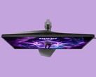 Das Bild zeigt den Gaming-Monitor AOC AG276UZ vor einem violetten Hintergrund. Der Gaming-Monitor zeichnet sich durch ein sehr spielerisches Design aus, das durch RGB-Beleuchtung auf der Rückseite abgerundet wird.