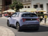 A rear shot of the Nio Firefly taking a sharp turn on asphalt