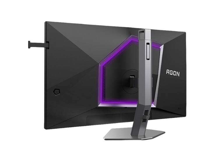 Das Bild zeigt die Rückseite des Gaming-Monitors AOC Agon Pro AG276UZ, der sich durch ein recht spielerisches Design mit violettem RGB-Licht auszeichnet. 