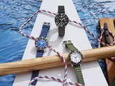 Drei Citizen Promaster Dive-Uhren mit weißem, schwarzem und blauem Zifferblatt, jeweils mit passender Tauchlünette und Urethanarmband.