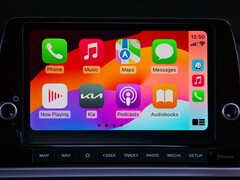 CarPlay-Startbildschirm mit App-Symbolen auf dem Touchscreen eines Kia