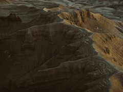 Das Symbolbild zeigt eine Luftaufnahme eines Berges. (Bildquelle: Harrison Steen via Unsplash; zugeschnitten)