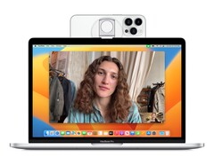 Die MagSafe-Halterung von Belkin befestigt ein iPhone auf dem Display eines MacBook. (Bild: Belkin)