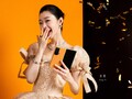 Ganz schick: Zur Schauspielerin Song Yi passt im Esquire-Werbeplakat auch das Honor Magic V Foldable im orangen Leder.
