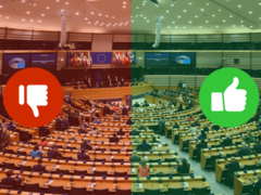 EU-Parlament im Hintergrund, Vordergrund: Daumen hoch oder runter