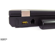 USB 2.0 mit Ladefunktion und der nur noch selten benötigte Modemanschluss ebenfalls am Heck