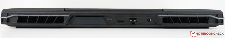 Rückseite: Anschlüsse für XMG OASIS (mit Abdeckung), USB-C 3.2 Gen2×1 (DisplayPort-Support 1.4a), HDMI 2.1 (G-SYNC-kompatibel, HDCP 2.3), RJ45 Port 2,5 Gbit (LAN), Netzteilanschluss