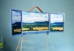 Dieser portable Computer besitzt drei Bildschirme, die für den kompakten Transport zusammengeklappt werden können. (Bild: DIY Perks)