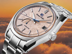 Die neue Grand Seiko SBGA525 ist ohne sichtbare Lünette konstruiert, sodass Licht aus verschiedenen Winkeln auf das Zifferblatt fallen kann.