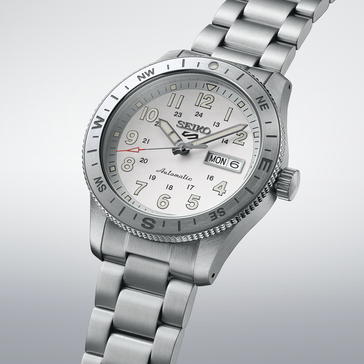 Seiko 5 Sports HDB007 automatic watch featuring a white dial, compass bezel, and steel bracelet.