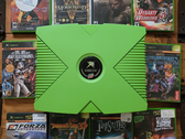 Eine grün gefärbte Xbox mit 10 abgebildeten Retro-Xbox-Titeln.