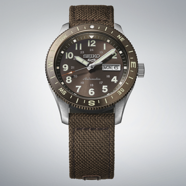 Seiko 5 Sports HDB009 automatic field watch with brown dial, compass bezel, and brown nylon strap.